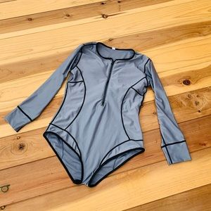 Silver reflective Rave body suit with front zipper